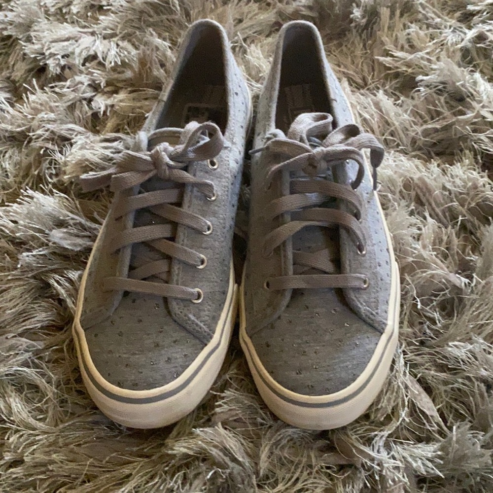 Gray Keds sneakers with glitter dots.